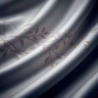 Close-up of the Forest Mist jacquard weave with its woven leaf pattern