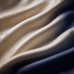 Close-up of the Golden Ivory jacquard weave with its woven foliage pattern