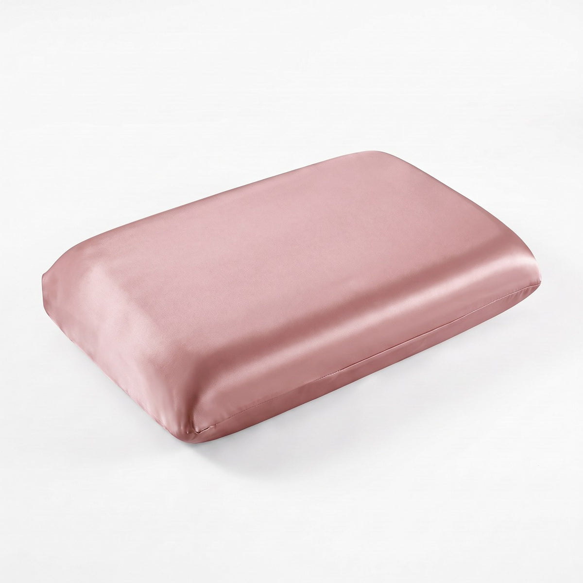 KINT fitted 19 momme mulberry silk pillow cover in Dusty Rose, on a memory foam pillow