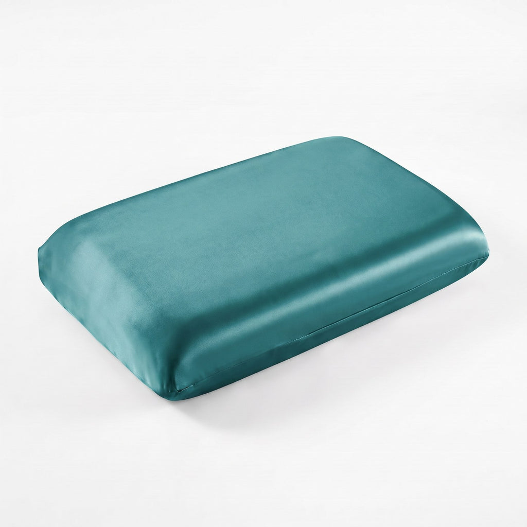 KINT fitted 19 momme mulberry silk pillow cover in Peacock Blue, on a memory foam pillow