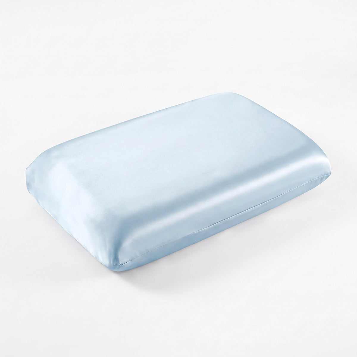 KINT fitted 19 momme mulberry silk pillow cover in Sky Blue, on a memory foam pillow