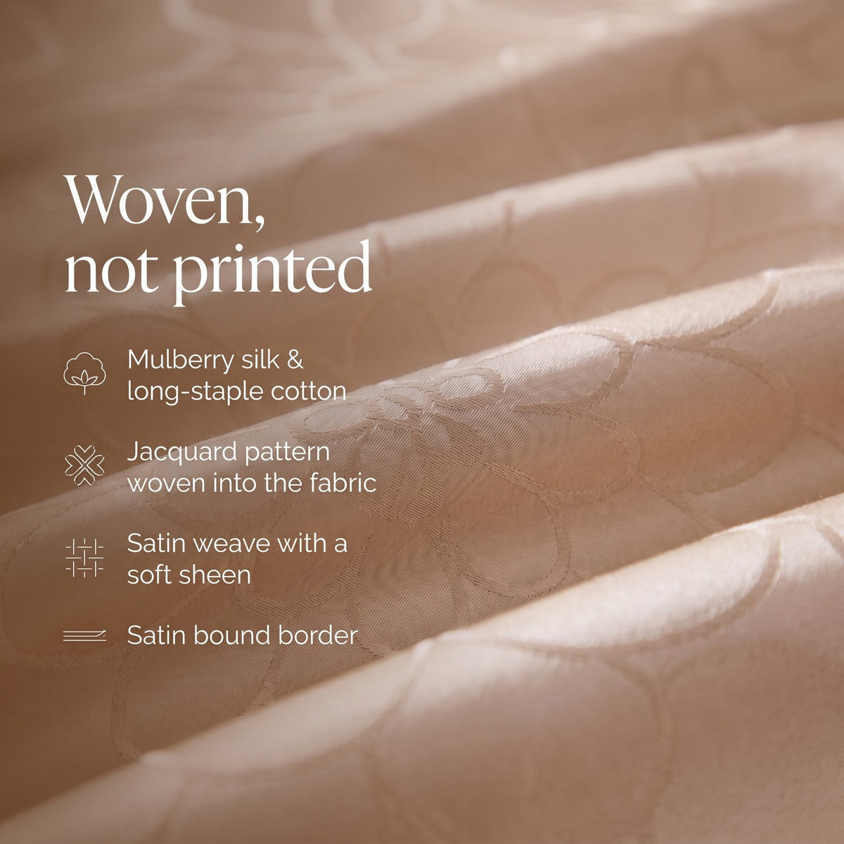 Woven, not printed: mulberry silk and long-staple cotton, jacquard pattern woven into the fabric, satin weave, satin bound border