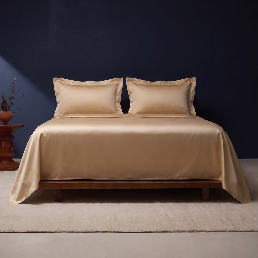 Bed made with the satin flat sheet and two pillowcases only