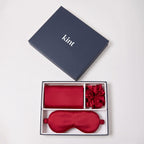 KINT 22 momme mulberry silk gift set (pillowcase, sleep mask and scrunchie) in Ruby Red, in a navy KINT gift box