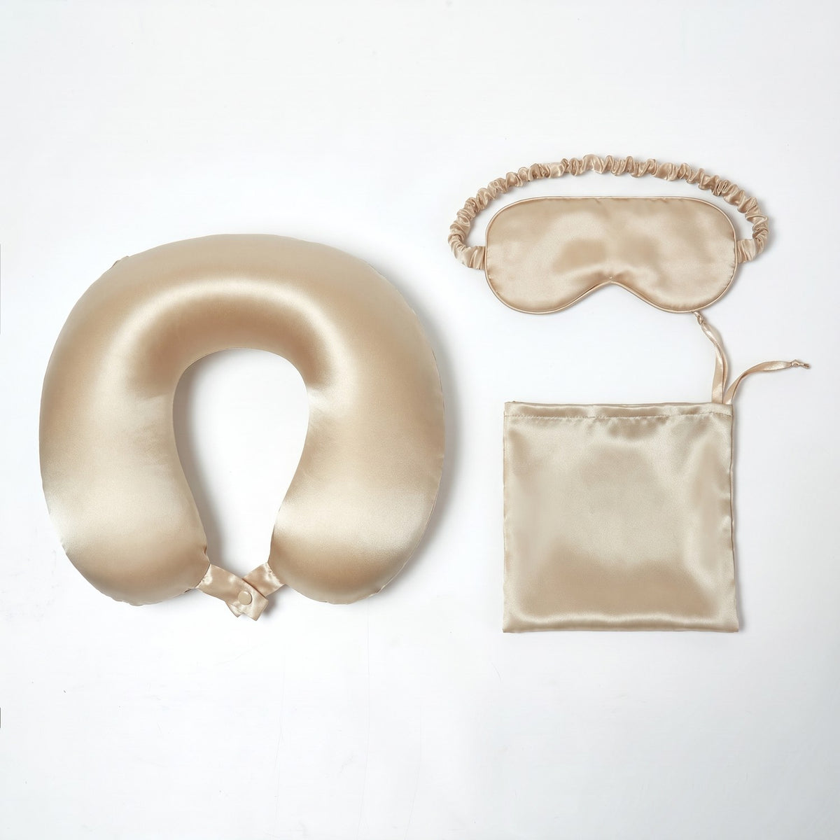 KINT 19 momme silk travel set (neck pillow, sleep mask and pouch) in Champagne